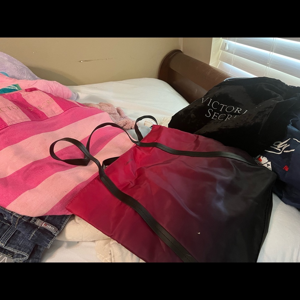 Ed hardy travel bag will be priced at $25 VS bags different colors